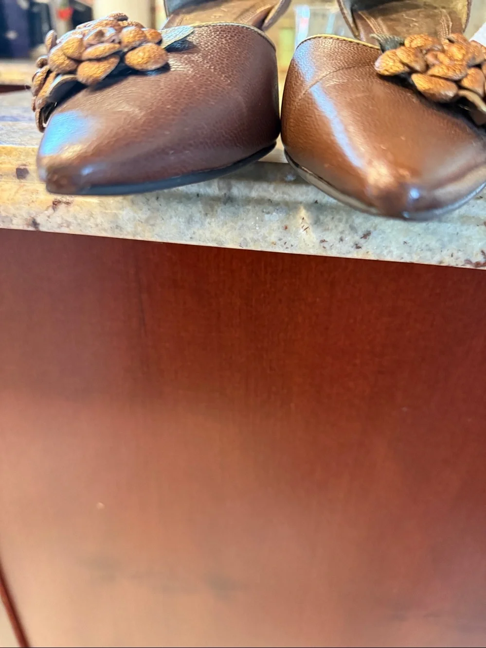 Unisa brown heels with 3D floral embellishments
